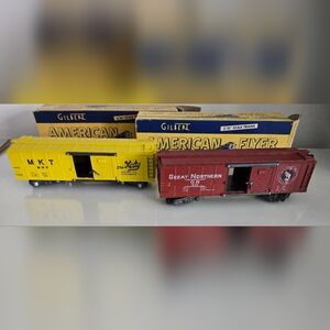 2 AMERICAN FLYER BOXCARS.  637 MKT Yellow AND Great Northern 913 Red Orig Boxes